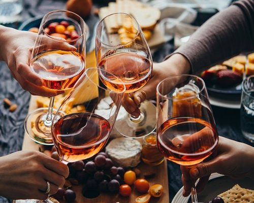 Glasses of rose wine seen during a friendly party of a celebration.